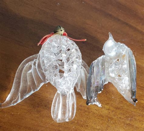 Description These beautiful ornaments are very gently loved in like new condition Excellent quality by Silvestri This purchase includes three (3) crystal ornaments as shown Each comes in its own original box Approximately 4. . Silvestri glass ornaments